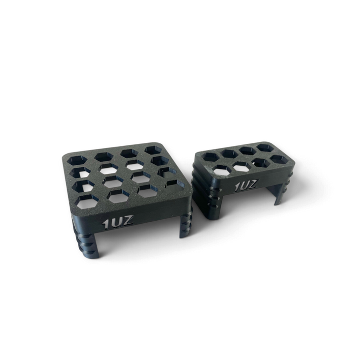LunaticsCo MK1 Motorsport 1UZ spark plug organizer trays in black ASA plastic with 8 and 16 plug capacity slots.