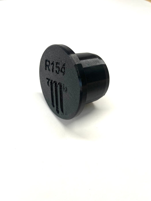 LunaticsCo MK1 Motorsport black plastic transmission output shaft plug for Toyota R154 manual transmissions.