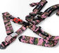 Lunaticsco NRG 5-point racing harness in pink camo with heavy-duty latch link buckle and 3-inch polyester straps.