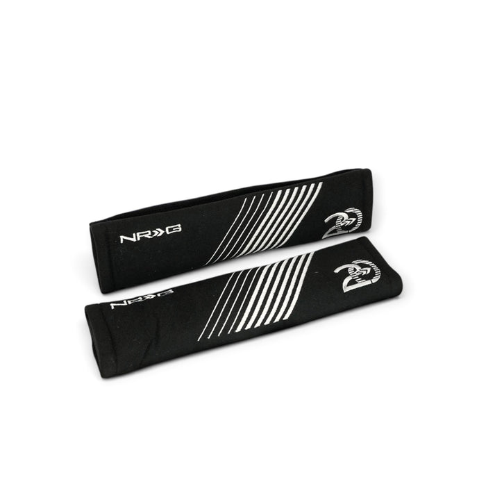Lunaticsco NRG 20th anniversary black seat belt pads with emerald green stitching and white branding