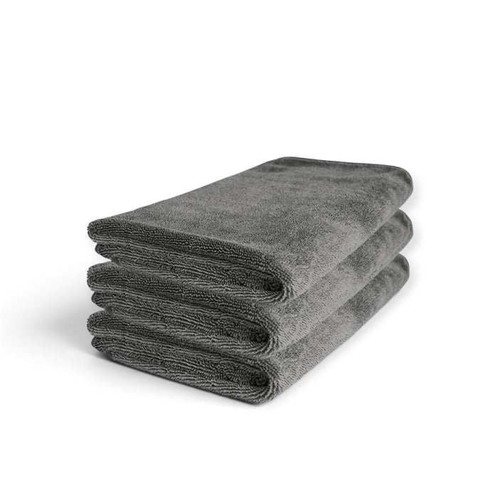 Lunaticsco WASH&WHIPS grey premium microfiber car cleaning towel folded in a stack for detailing