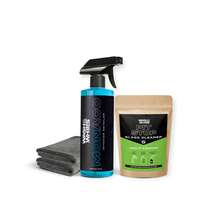 Lunaticsco WASH&WHIPS Monaco interior detailer spray, Pit Stop glass cleaner refill pouch, and grey microfiber towel.