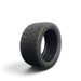 Lunaticsco Zeknova Grantourer competition drift and track tire featuring an asymmetric tread pattern and black rubber.