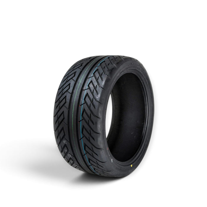 Lunaticsco Zeknova Lanz 8 420TW drift tire featuring a directional tread pattern and coloured wear indicator stripes.