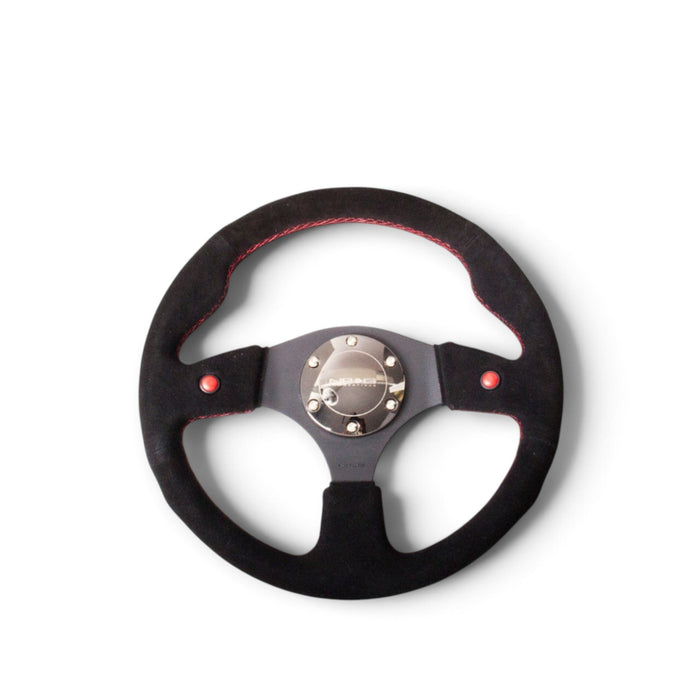 NRG Reinforced Steering Wheel (320mm) Blk Suede w/Dual Buttons - Lunaticsco