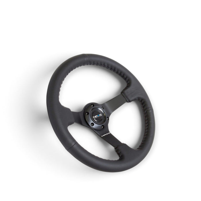 NRG Reinforced Steering Wheel (350mm / 3in. Deep) Bk Leather w/Bk BBall Stitch (Odi Bakchis Edition) - Lunaticsco